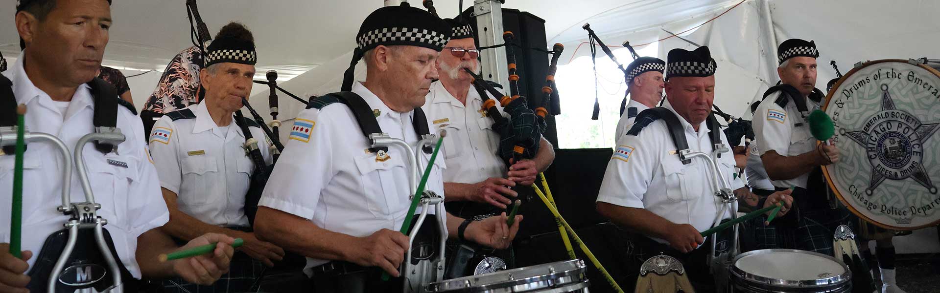 Bagpipes and Drums of the Emerald Society playing at Gaelic Park Irish Fest